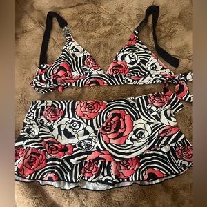 Bikini top and skirt with bikini bottoms built in.